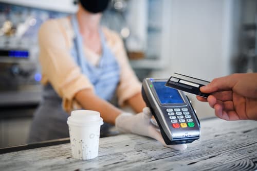 Contactless,Payment,With,Debit,Card,,Coffee,Shop,Open,After,Lockdown. community safety for local businesses